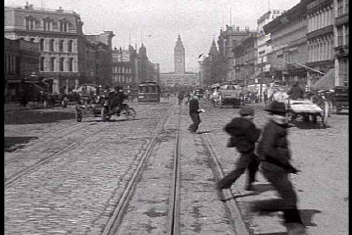 1900s - A trip down Market Street in San Francisco shows a fascinating glimpse of the city before the devastating earthquake of 1906. Royalty-Free Stock Footage #3913652