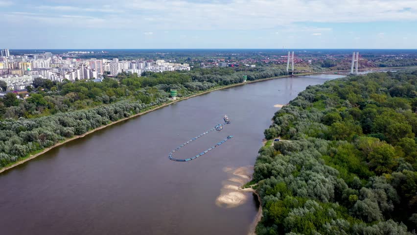 4k drone footage of Vistula River bank in Mokotow district of Warsaw city, Poland