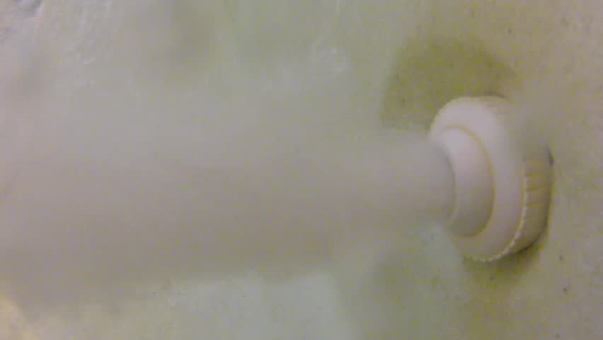 Underwater shot of hotel hot tub jets and bubbles.