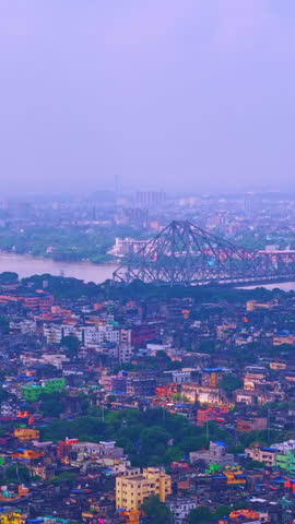 Howrah Bridge Over Hooghly River – Aerial Drone Shot of Kolkata Cityscape