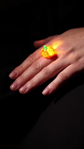 Wearing Halloween Pumpkin Ring That Lights up on Finger