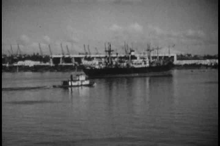 1940s - Shots of Portland in 1947 including shipbuilding, mills, manufacturing and dams on Columbia River.