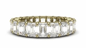 A stunning close-up shot of a luxury eternity ring featuring brilliant, continuous diamonds set in a gold band. The ring is shown in a smooth, captivating rotation against a clean, bright white backgr - Powered by Shutterstock - Get 15% off with code: PIKWIZARD15
