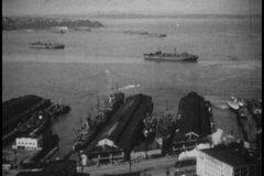 1940s - Shots of Seattle in 1947 including shipbuilding, manufacturing and transportation.