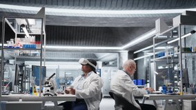 Black woman using VR headset to explore 3D interactive experiment in laboratory, biochemistry and nanotechnology study. Expert uses virtual reality glasses and gadgets for science. Camera B. - Powered by Shutterstock - Get 15% off with code: PIKWIZARD15