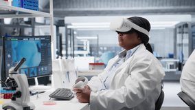 Woman expert in laboratory using VR headset to simulate experiment and research study. Virtual reality tech supporting microbiology and advanced medical discovery in healthcare. Camera B. - Powered by Shutterstock - Get 15% off with code: PIKWIZARD15