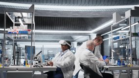 African american expert using VR glasses in lab for molecular research, virtual reality gadgets helping with biotechnology and genetics research. Modern interactive tech in laboratory. Camera A. - Powered by Shutterstock - Get 15% off with code: PIKWIZARD15