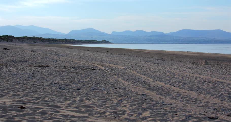 Extra wide shot looking east of Llanddwyn beach at the Newborough National Nature Reserve.