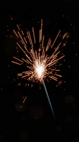 Festival Celebration Sparkler with Soft Golden Bokeh