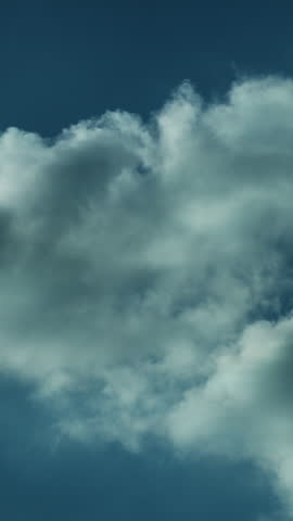 4K Vertical Dynamic Cloud Movement in Deep Blue Timelapse