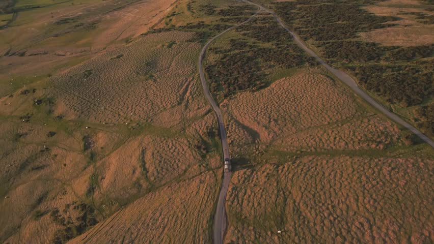 Aerial drone view of Hay Bluff Mountain in Wales, UK, showcasing rolling hills, scenic landscapes, and breathtaking natural beauty from above.