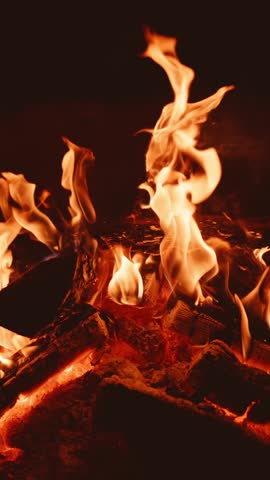 The Captivating Flames Dance Elegantly in the Dark A Mesmerizing Fire Scene Awaits You