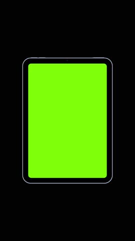Animated mini tablet with green screen mockup smoothly zooming on black background. Perfect for app demos, UI design, advertising, product showcase and digital presentations