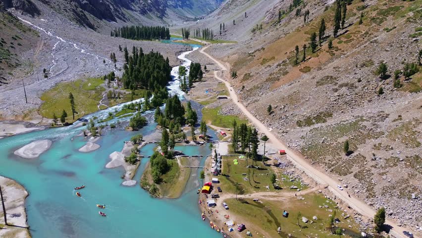 Majestic Aerial View of Turquoise River, Alpine Valley, and Mountain Landscape in Swat Valley, Pakistan
