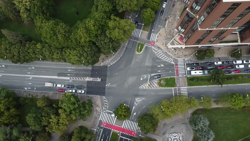 Aerial Drone View of Urban Traffic Intersection in Pamplona, Navarre, Spain – Cars and City Streets