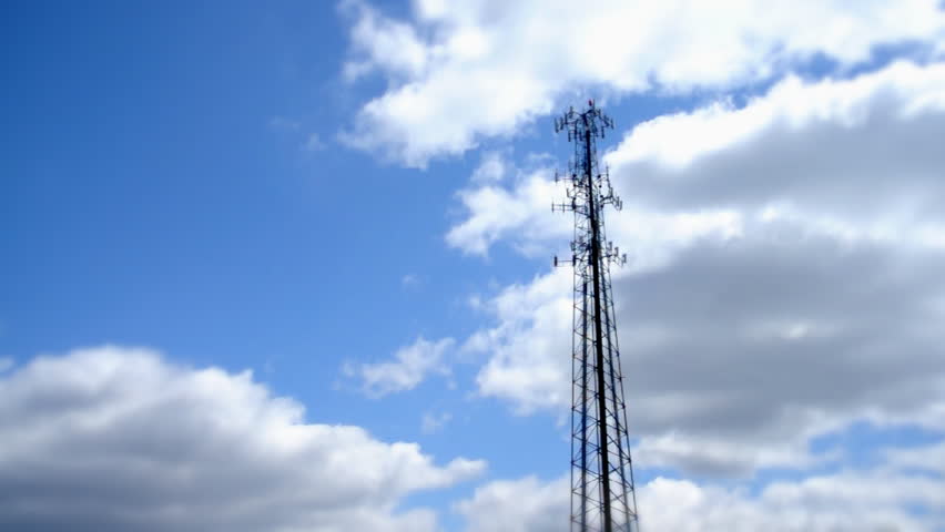 A time lapse shot of a communications tower.