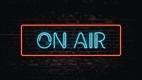 Bright glowing “ON AIR” neon sign illuminated against a dark wall, symbolizing live broadcasting, media production, and creative studio energy. Perfect for technology and entertainment visuals. - Powered by Shutterstock - Get 15% off with code: PIKWIZARD15