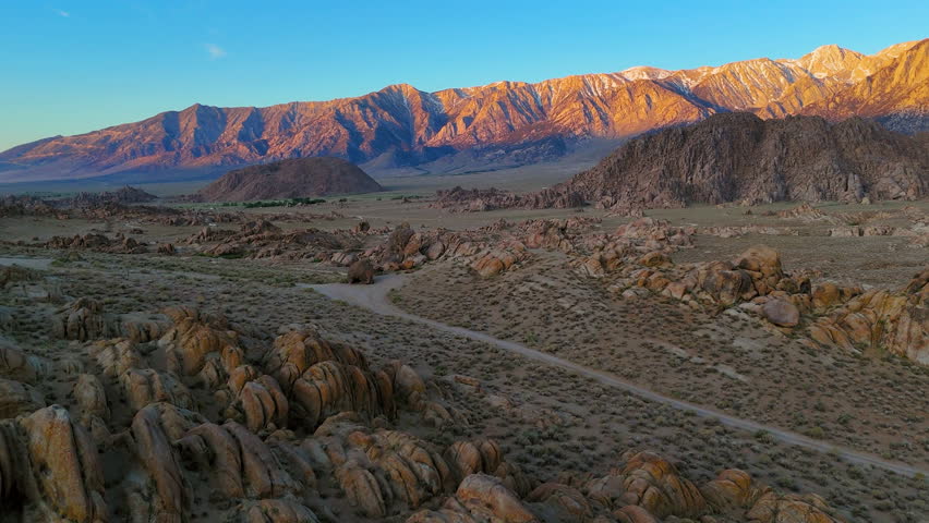 Aerial view over rocky desert nature of Alabama Hills, sunset in California, USA