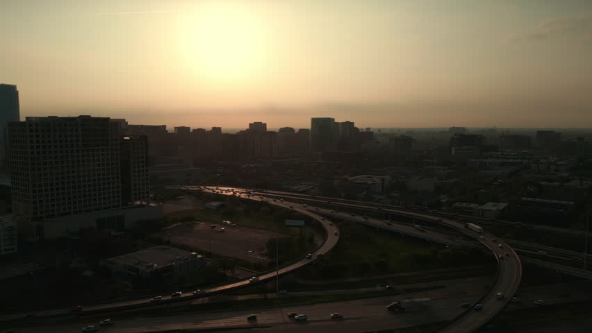 Panning Aerial of Dallas Highway at Sunset