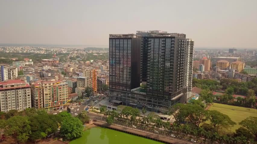  Futuristic aerial view panorama of developing Yangon city , Aerial view of Sule pagoda in downtown, Yangon, Myanmar. Sule Pagoda located in the heart of Yangon, Karaweik royal barge, Kandawgyi Lake, 