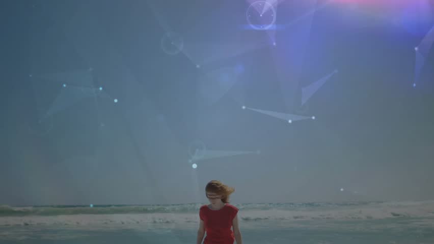 Woman stepping from surf and walking toward camera on shore, revealing glowing technology network. Beach, shoreline, sunset, digital, innovation, exploration, serenity - Powered by Shutterstock - Get 15% off with code: PIKWIZARD15