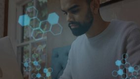 Developer typing code animating hexagonal DNA charts for data analysis while scrolling smartphone. Technology, innovation, digital, concentration, workspace, creative, futuristic - Powered by Shutterstock - Get 15% off with code: PIKWIZARD15