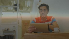 Adult man tapping tablet in cafe, generating transparent code and interface overlays analyzing data. Technology, innovation, digital, futurism, professional, casual, modern - Powered by Shutterstock - Get 15% off with code: PIKWIZARD15