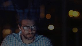 Studying code laptop generating binary overlays window while man rubbing eyes confronting intrusion. Technology, cybersecurity, work, innovation, concentration, night, digital - Powered by Shutterstock - Get 15% off with code: PIKWIZARD15