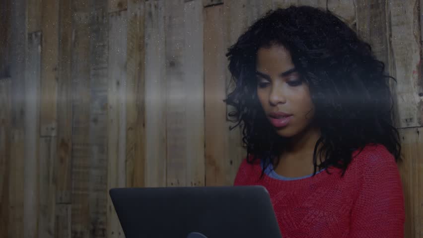 Woman leaning into laptop and activating floating globe icons code snippets bar charts for analysis. Technology, data visualization, analytics, digital interface, modern workspace, professional - Powered by Shutterstock - Get 15% off with code: PIKWIZARD15