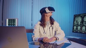Medical Researcher in White Coat With Stethoscope Using VR Headset and Hand Gestures to Explore Virtual Brain Models. Concept of Immersive Technology in Neuroscience and Future Healthcare. - Powered by Shutterstock - Get 15% off with code: PIKWIZARD15