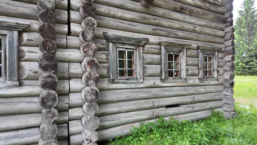 A log house in a Russian village. Slow motion.