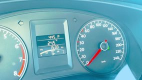 Futuristic modern car speedometer gauge showing vehicle's speed and fuel level turned on the dashboard with an electronic odometer in kilometers recording distance traveled. Illuminated acceleration. - Powered by Shutterstock - Get 15% off with code: PIKWIZARD15