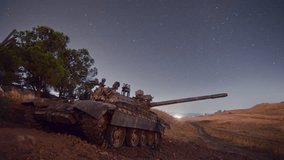 Abandoned Syrian Tank Under Spinning Star Trails Around Polaris - Powered by Shutterstock - Get 15% off with code: PIKWIZARD15