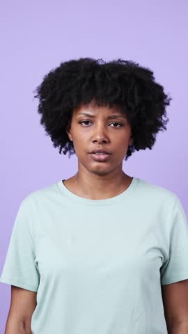 Young woman suffering from back pain in slow motion