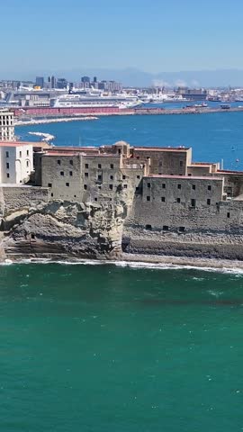 Dell Ovo Castle At Naples In Campania Italy. Downtown Cityscape. Bay Of Naples Landscape. Dell Ovo Castle At Naples In Campania Italy. Medieval Castle. Skyline Medieval Building. Italy Landscape.