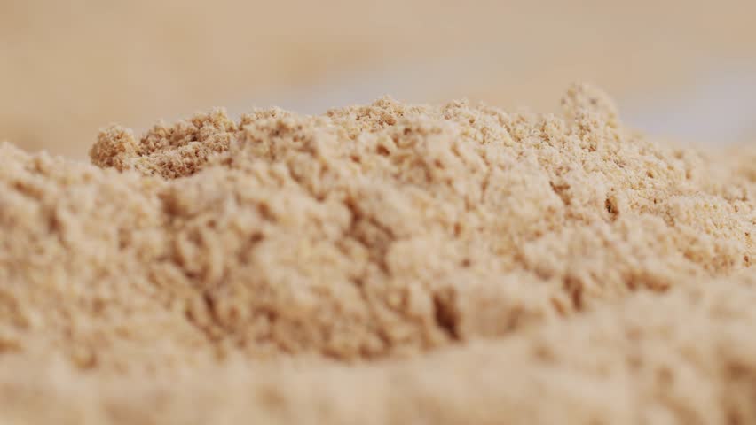 Ashwagandha Indian Ginseng Powder in White Bowl isolated on white background, superfood close up. 