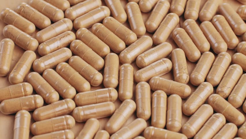 Ashwagandha Indian Ginseng Powder in White Bowl isolated on white background, superfood close up. 