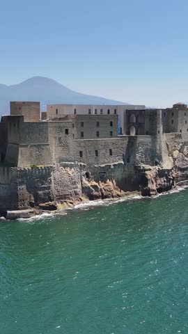 Dell Ovo Castle At Naples In Campania Italy. Downtown Cityscape. Bay Of Naples Landscape. Dell Ovo Castle At Naples In Campania Italy. Medieval Castle. Skyline Medieval Building. Italy Landscape.