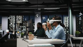 Female office worker using VR headset with artificial intelligence after hours, working hard with virtual reality to ensure tasks completion and forecasting projections. 3D simulation. Camera A. - Powered by Shutterstock - Get 15% off with code: PIKWIZARD15