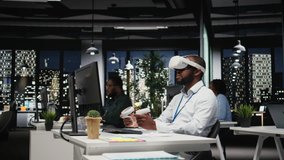 Black businessman using VR headset and gadgets to draft a project plan, engaged in forecasting projections and documenting risk assessment results. Solve tasks with virtual reality. Camera A. - Powered by Shutterstock - Get 15% off with code: PIKWIZARD15