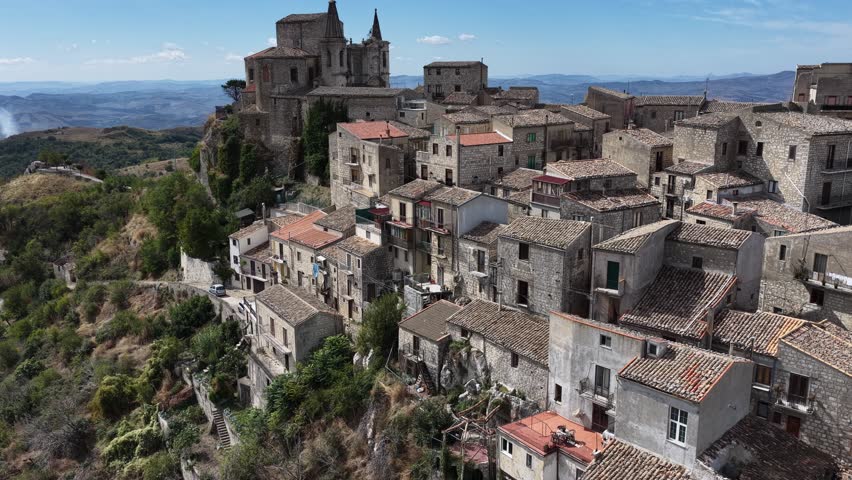 Aerial drone view of Petralia Soprana, a historic Sicilian mountain town with panoramic views of the Madonie Mountains,Petralia Soprana famous Church of Saint Mary of Loreto, Sicily, Italy