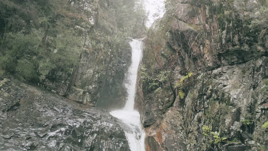 Aerial panning footage showing Lower Rollasons Falls in Mount Buffalo National Park.