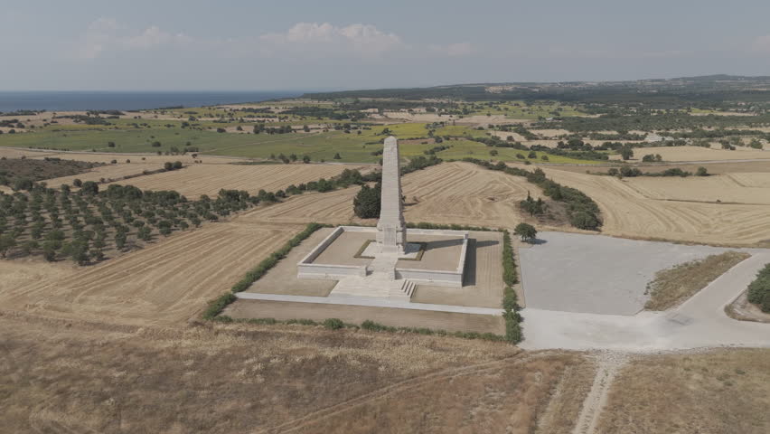 D-Log M. Seddulbahir, Eceabat, Turkey. Aerial view of Helles Memorial obelisk at Cape Helles on Gallipoli Peninsula commemorating World War I casualties. Aerial view, Departure of the camera, MasterS