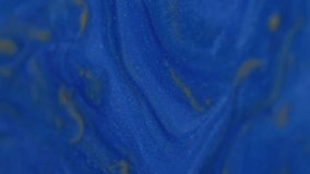 Vertical video. Splatter texture. Paint spill. Defocused blue yellow color shiny drop liquid blend floating on abstract art background. - Powered by Shutterstock - Get 15% off with code: PIKWIZARD15