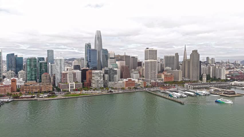 San Francisco Cityscape Skyline, Drone Shot of Financial District Skyscrapers and Embarcadero Traffic From Bay, California USA