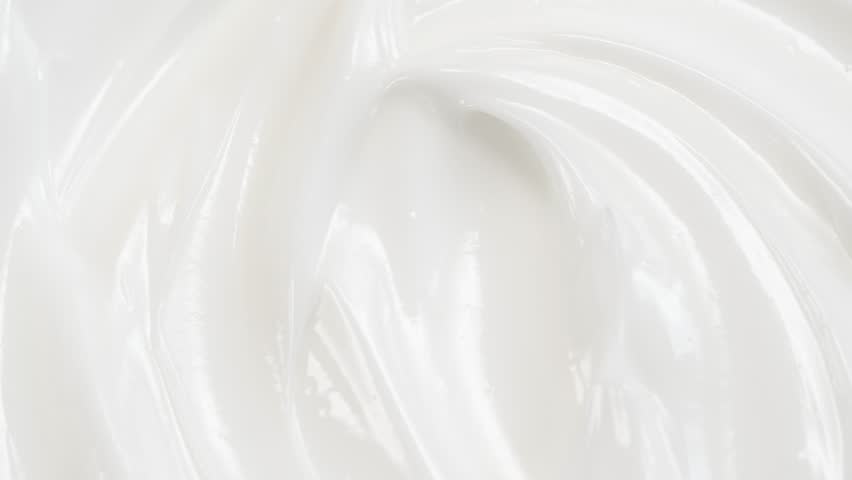 Macro white smooth eye, skin cream texture, closeup beauty facial cosmetics mask