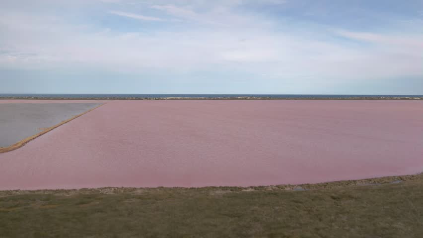A beautiful slow moving reveal of Pink Lake, situated on the coast of Western Australia.