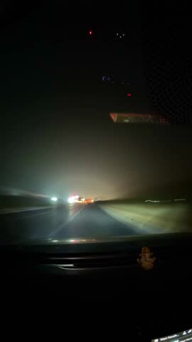 2x speed hyperlapse shows a car moving forward on a bustling Indian street at night as other vehicles blur past creating a dynamic vibrant urban motion scene with glowing lights and fast-paced energy