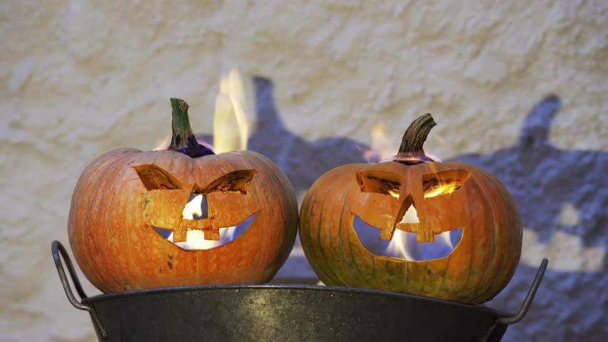 halloween pumpkins burning in Samhain Samain traditional fest , 4k real video footage background