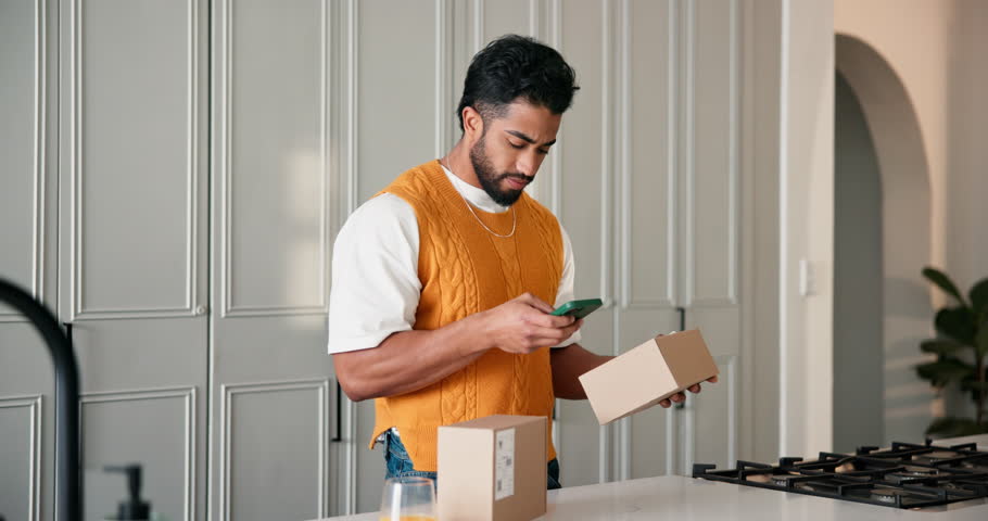 Happy man, box or phone with delivery for cargo notification, confirmation or verification in home. Male person, online shopping or checking packages with mobile smartphone for courier service review